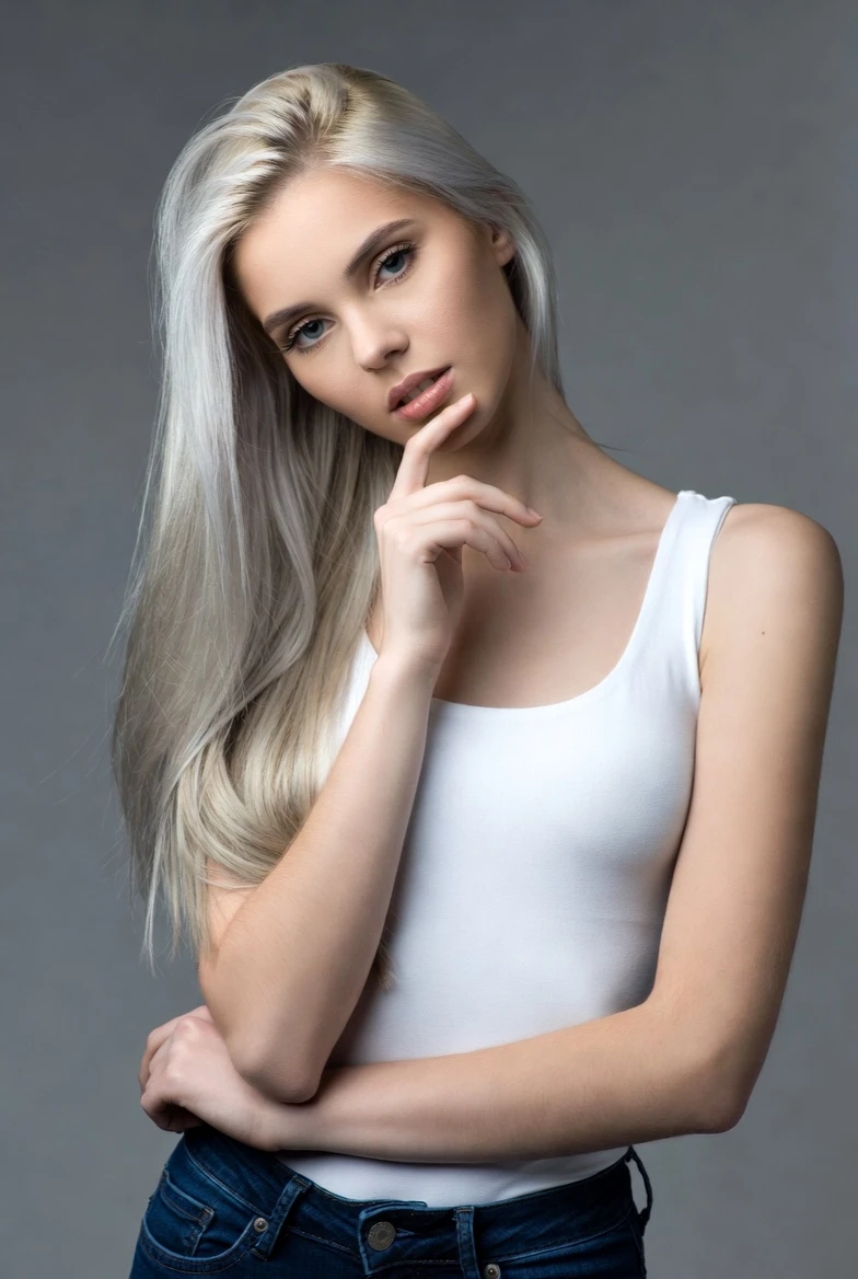 Discover This Intriguing Standing Chin-Ponder Pose for Stunning Shots 