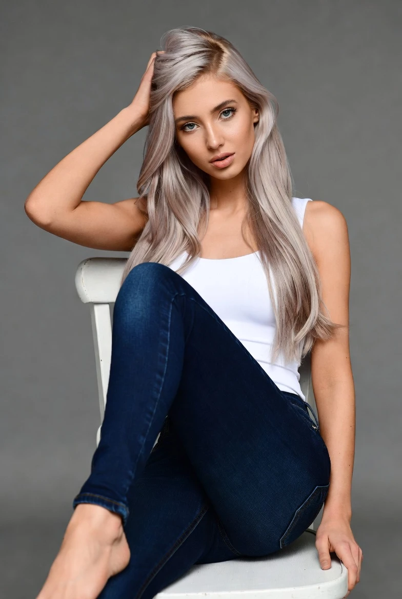 Elevate Your Portraits with This Iconic Blonde Hair-Flirt Pose 