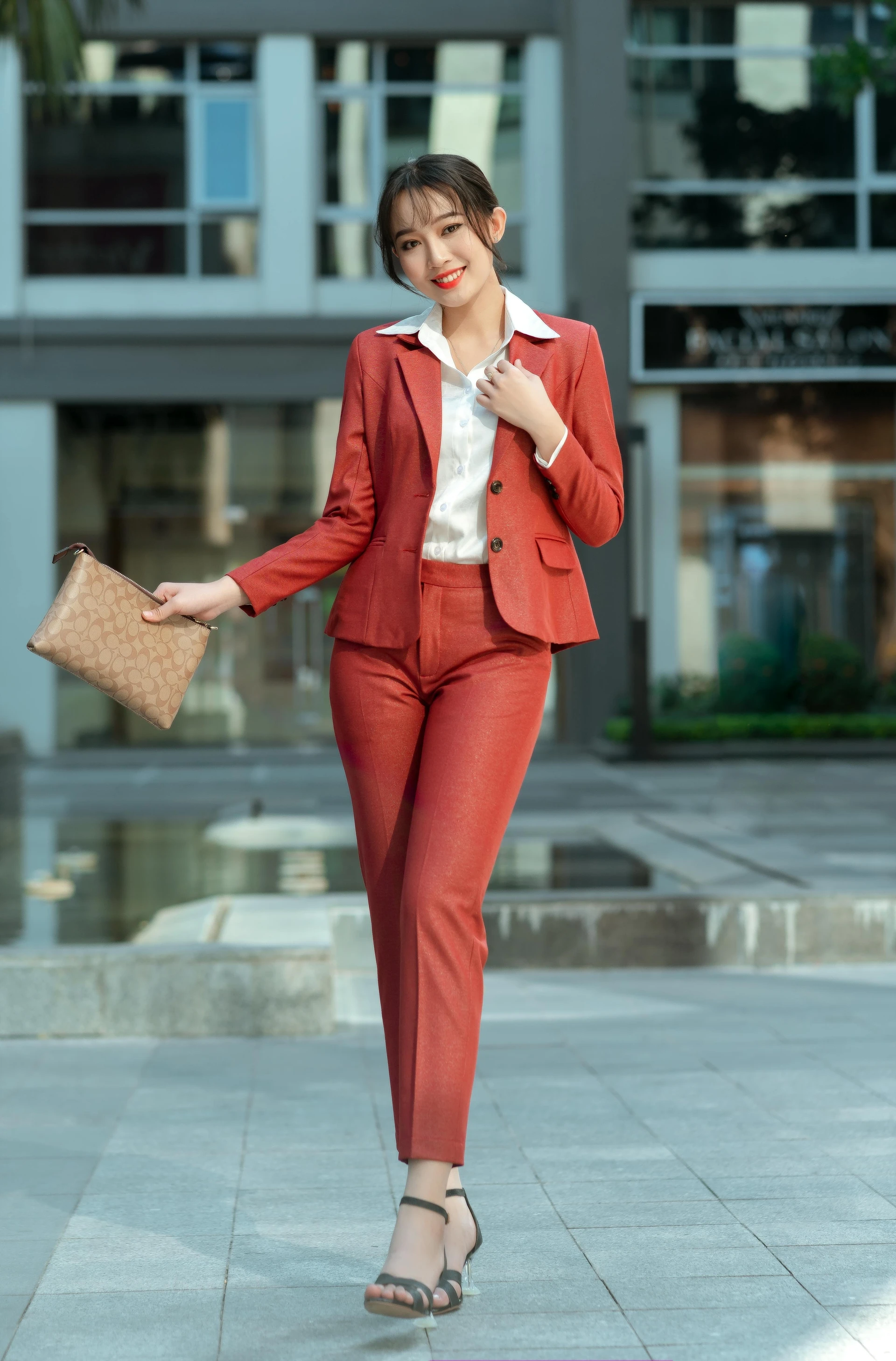 How to wear a rust red pantsuit for work without looking overdressed