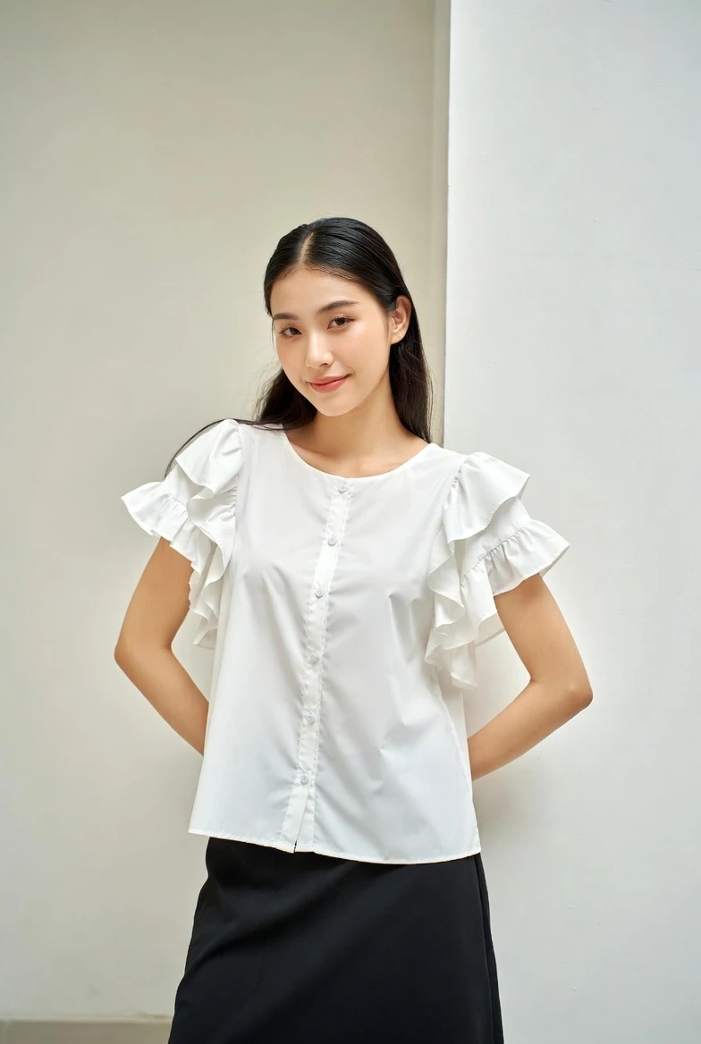 Shine in Feminine Ruffles: Recreate This Playful White Blouse Look